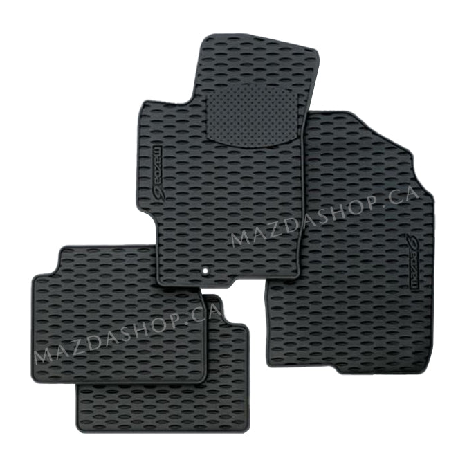 Set of black car floor mats with a textured pattern on a white background, branded &#39;MAZDASHOP.CA&#39;.