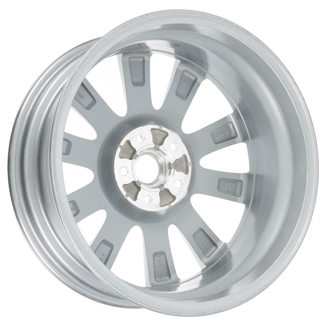 Silver alloy wheel on a white background