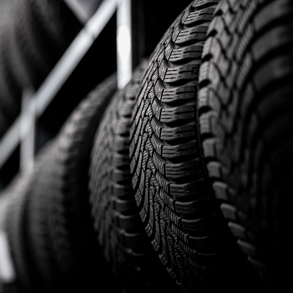 Close-up of tire tread pattern with a blurred background