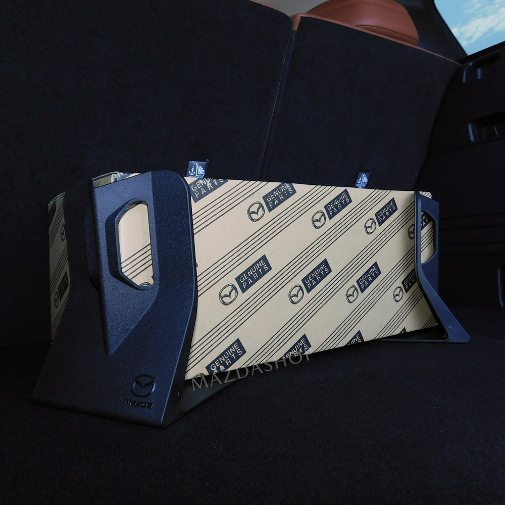 Cargo Blocks holding package in trunk